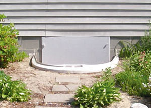 Rigid plastic crawl space access well installed in a Port Washington crawl space