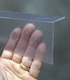 Closeup of a clear plastic covering on a Deer Park crawl space block wall