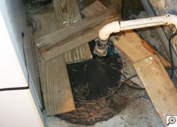 An ugly, clogged sump pump system in Islip, Long Island