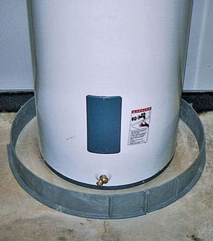 An old water heater in Dix Hills, LI with flood protection installed