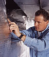 Installing a radiant heat & vapor barrier in a basement in Smithtown