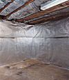 An energy efficient radiant heat and vapor barrier for a Dix Hills basement finishing project