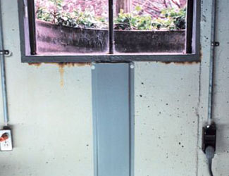 Repaired waterproofed basement window leak in Great Neck